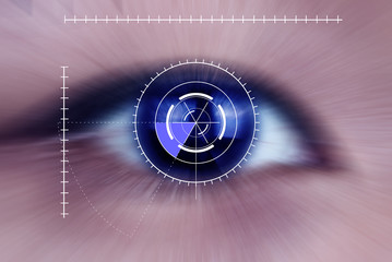 Abstract Security Iris or Retina Scanner being used on an Intense Blue Human Eye, Macro