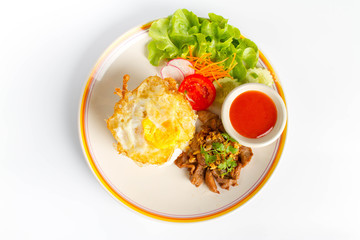 Pork stir-fried with garlic and peppercorns on white background