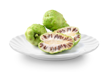 Fototapeta na wymiar Exotic Fruit - Noni in white plate on white background