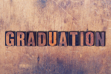 Graduation Theme Letterpress Word on Wood Background