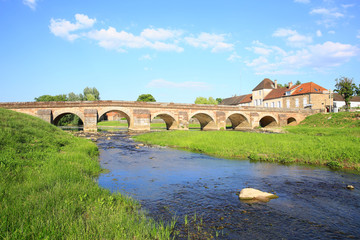 Historic bridge over the river Le Serein in Guillon, Burgundy, France