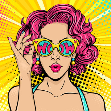 Wow pop art face. Sexy surprised woman with pink curly hair and open mouth holding sunglasses in her hand with inscription wow in reflection. Vector colorful background in pop art retro comic style.