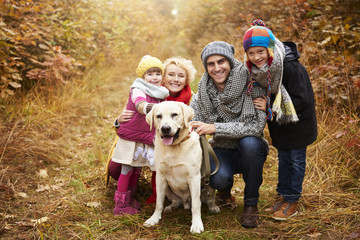 Portrait of family in forest path