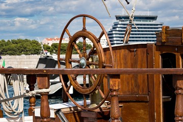 Wooden rudder on the boat © Michal