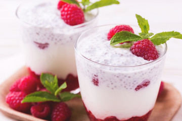 Raspberries chia pudding and fruit smoothie with mint