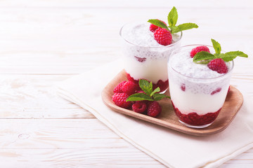 Raspberries chia pudding and fruit smoothie with mint