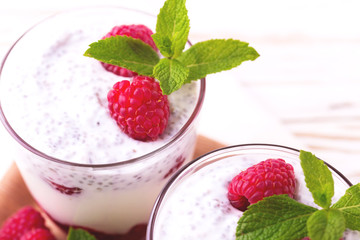 Raspberries chia pudding and fruit smoothie with mint