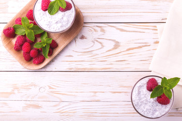 Raspberries chia pudding and fruit smoothie with mint