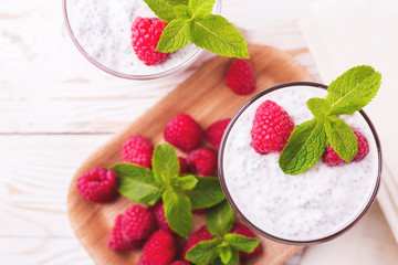 Raspberries chia pudding and fruit smoothie with mint