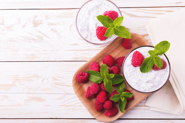 Raspberries chia pudding and fruit smoothie with mint