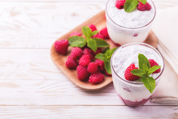 Raspberries chia pudding and fruit smoothie with mint