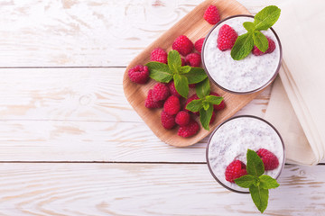 Raspberries chia pudding and fruit smoothie with mint