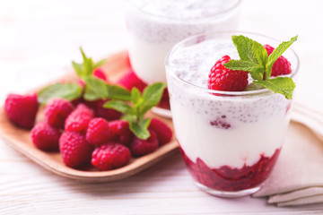 Raspberries chia pudding and fruit smoothie with mint