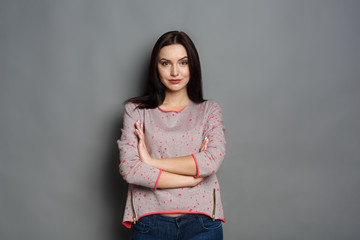 Confident woman portrait, studio shot