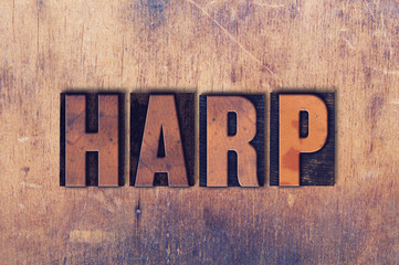 Harp Theme Letterpress Word on Wood Background
