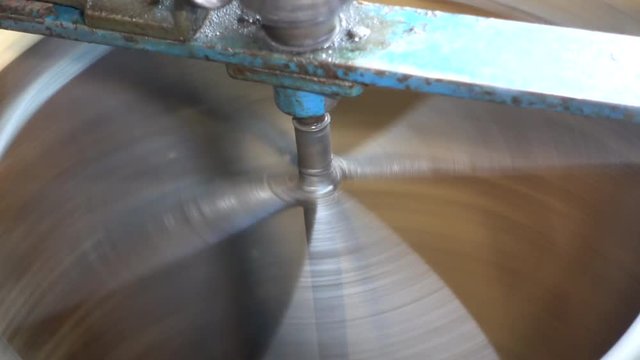 Machine for honey extraction during work. Honey extractor machine