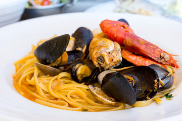 Pasta with seafood Dinner Dish on a the table