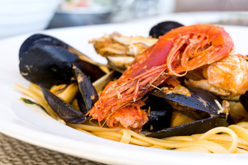 Pasta with seafood Dinner Dish on a the table