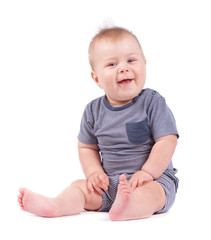 Portrait of smiling baby boy isolated on white background
