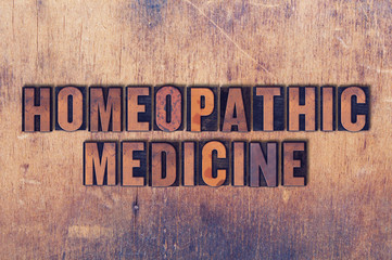 Homeopathic Medicine Theme Letterpress Word on Wood Background