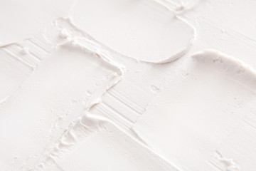 Fototapeta na wymiar Decorative plaster texture, white relief backdrop