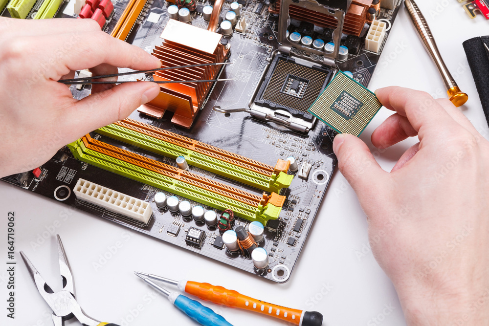 Poster Technician plug in microprocessor to motherboard