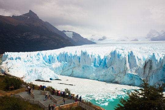 Tourists on observation deck of glacier Perito Moreno