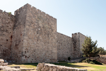 Fototapeta na wymiar Fragment of the fortress walls of the old tow in Jerusalem