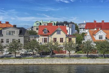 Row of ancient colorful wooden houses in the city of Karlskrona, Sweden