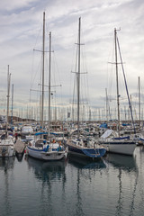 Fototapeta na wymiar Picturesque yachts in harbor of Lanzarote island, Canary Islands, Spain