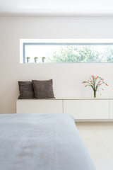 White cabinet and horizontal window
