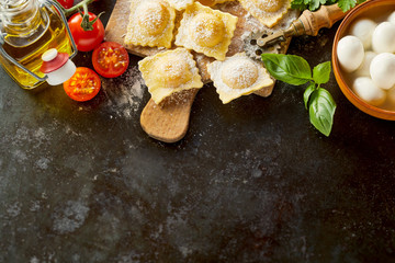 Italian ravioli pasta border with ingredients