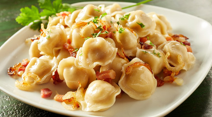 Plate of delicious regional Russian pelmeni