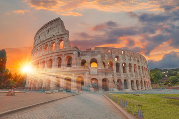 Naklejka na ściany i meble View of Colosseum in Rome and morning sun, Italy, Europe.