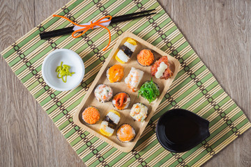 Sushi with salmon, prawn, avocado, cream cheese. Sushi menu. Japanese food.Top view.