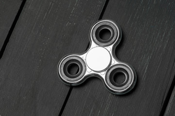 spinner on a wooden table. close up