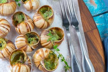 Baked snails with garlic butter and fresh herbs