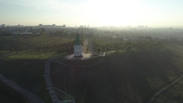 Church of Paraskeva Pyatnitsa is symbol of Krasnoyarsk. City in Siberia, Russia. Russian old architecture. Aerial drone flight around. 4K format