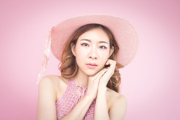 Beautiful korea woman posing at pink background with summer concept, isolated on pink background, 20-30 year old.