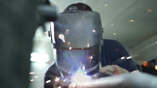 Assembly of the motorcycle. welder