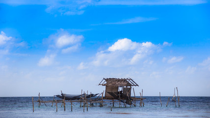 Fototapeta na wymiar sea fishing floating traditional house sky