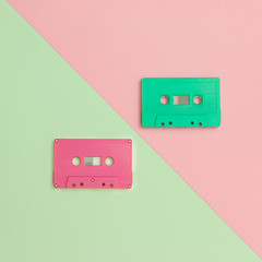 Retro cassette tapes on pastel color background, minimal style