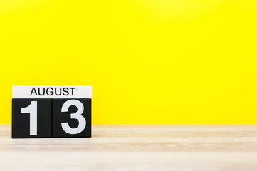 August 13th. Image of august 13, calendar on yellow background with empty space for text. Summer time