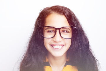 Obraz premium Image of a beautiful African young girl wearing glasses.