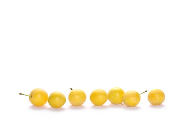 Wild plums with leaves and twigs, ringlov, isolated on white background