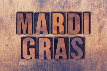 Mardi Gras Theme Letterpress Word on Wood Background