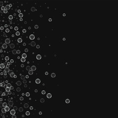 Obraz premium Soap bubbles. Scatter left gradient with soap bubbles on black background. Vector illustration.