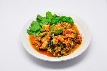Shrimp salad with lemongrass and mint in white plate and white background
