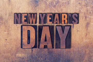 New Year's Day Theme Letterpress Word on Wood Background