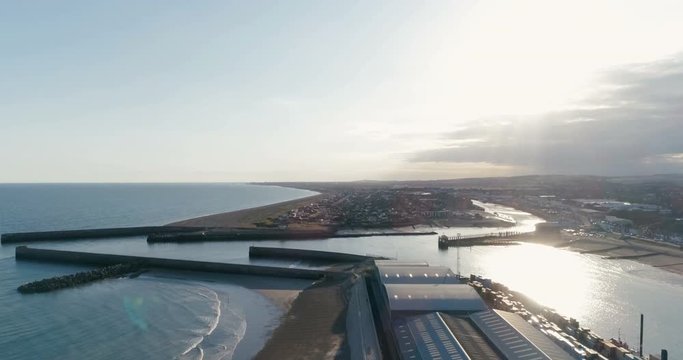 Descending view of the mouth of the river Adur near Brighton, Southern England